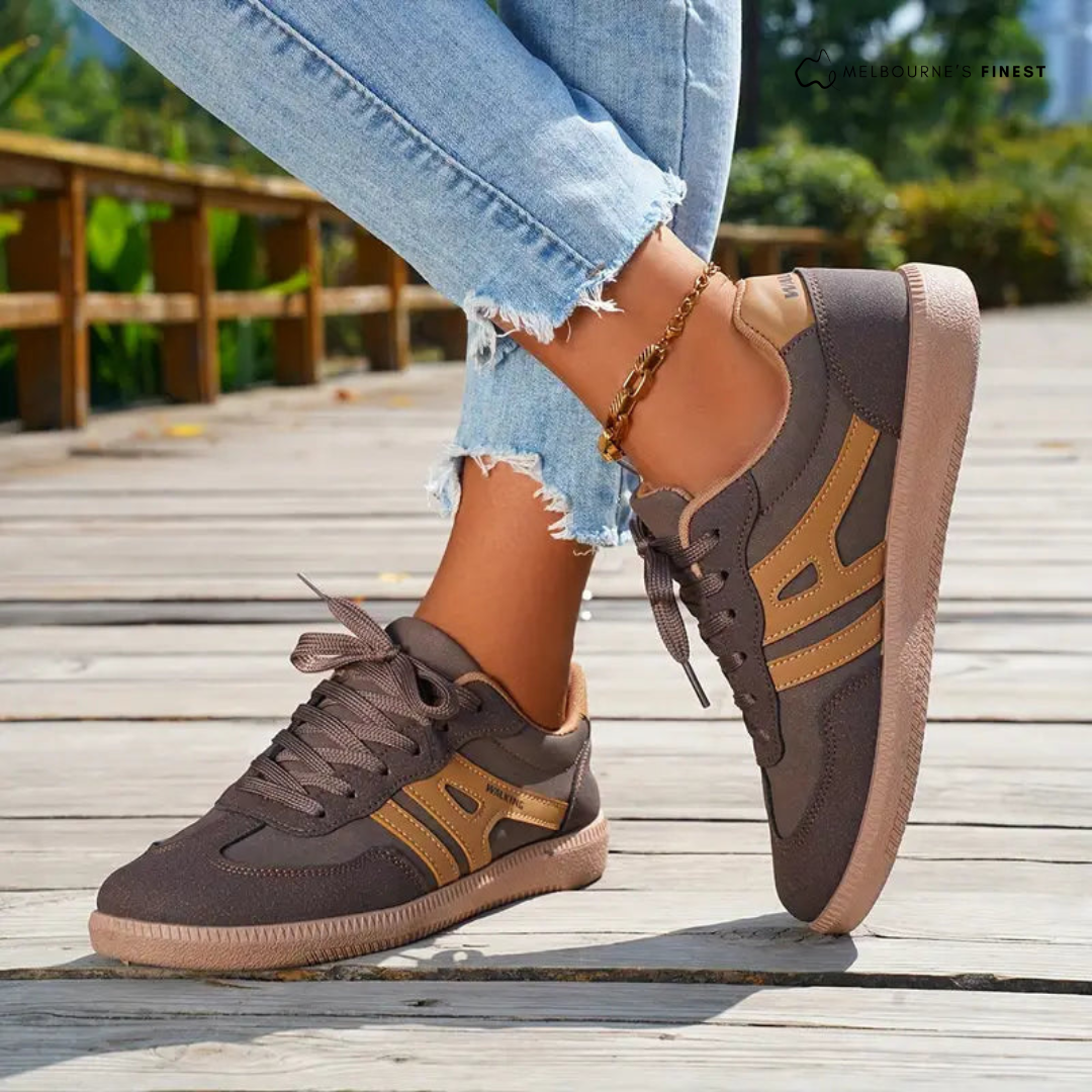 Brown and beige orthopedic shoes on a woman&