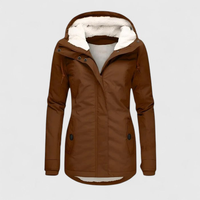 Brown winter coat with hood, cozy interior lining, and button details in a studio setting.