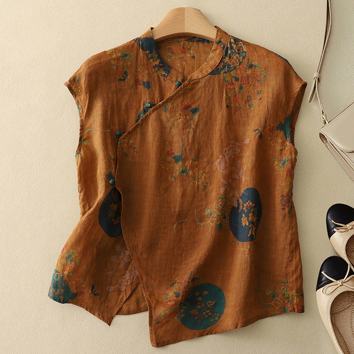 Rich brown floral sleeveless top on a hanger, featuring a soft texture, set against a light background with shoes and a bag.