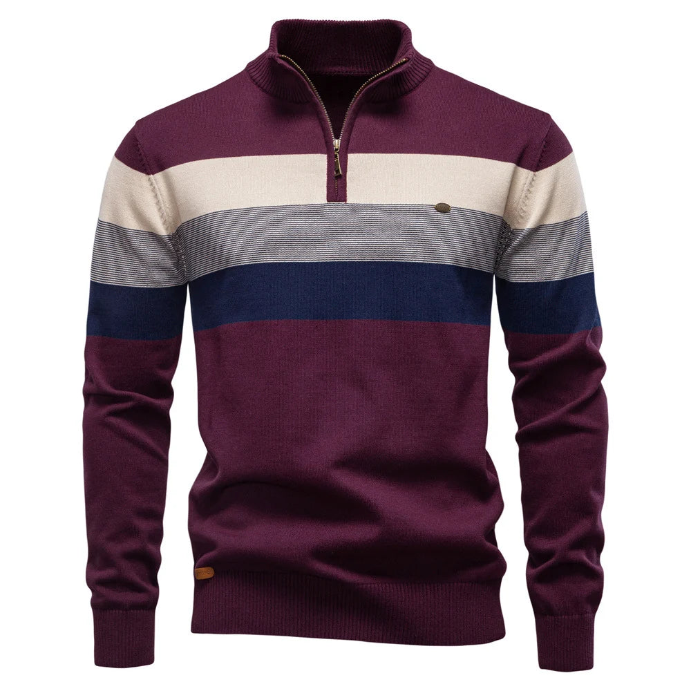 Burgundy and beige striped pullover showcased on a simple white studio backdrop.