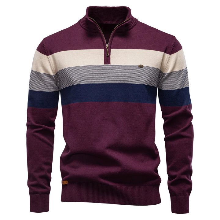 Burgundy and beige striped pullover showcased on a simple white studio backdrop.