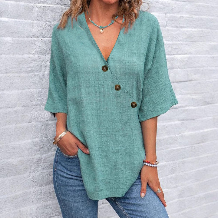 Kiray – V-Neck Blouse with Asymmetric Button Detail