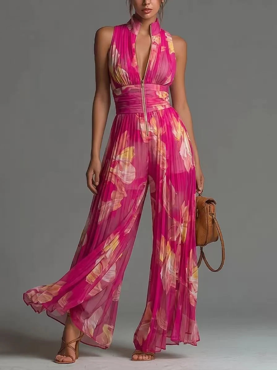 Pink floral jumpsuit with pleats and zip closure in studio setting.