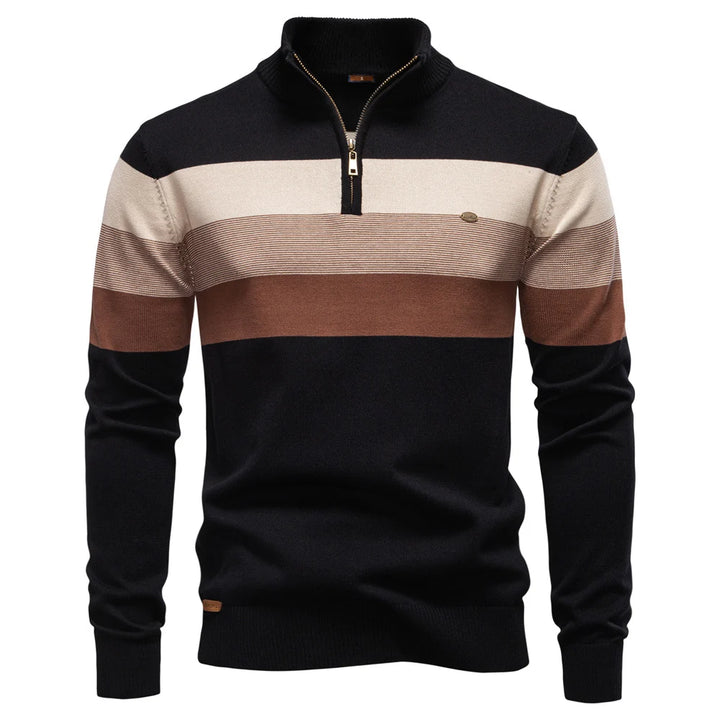 Black and tan striped pullover displayed on a white studio background.