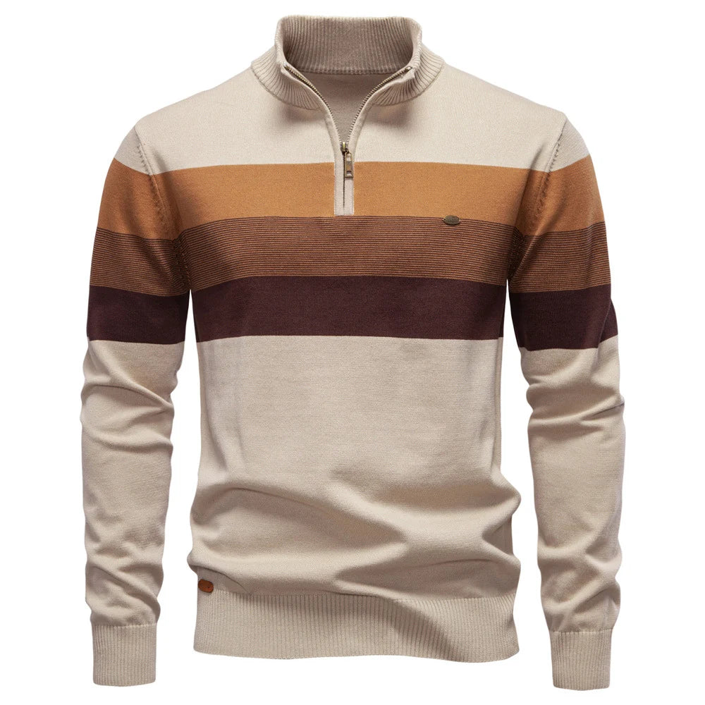Cream and brown striped pullover featured on a simple white background.
