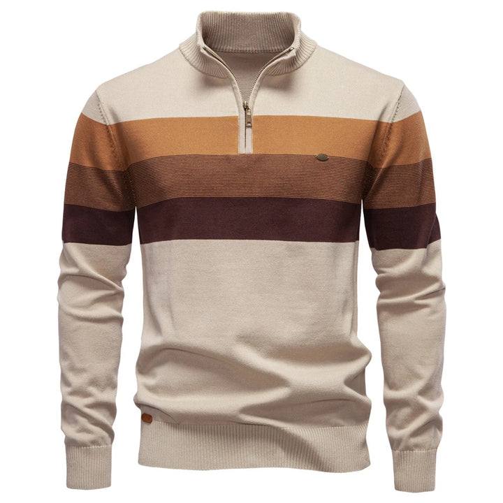 Cream and brown striped pullover featured on a simple white background.