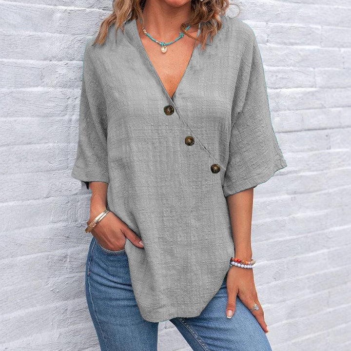 Kiray – V-Neck Blouse with Asymmetric Button Detail