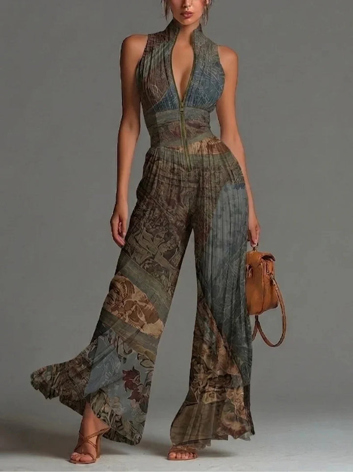 Patterned jumpsuit with earthy tones, pleats, and zip in studio setting.