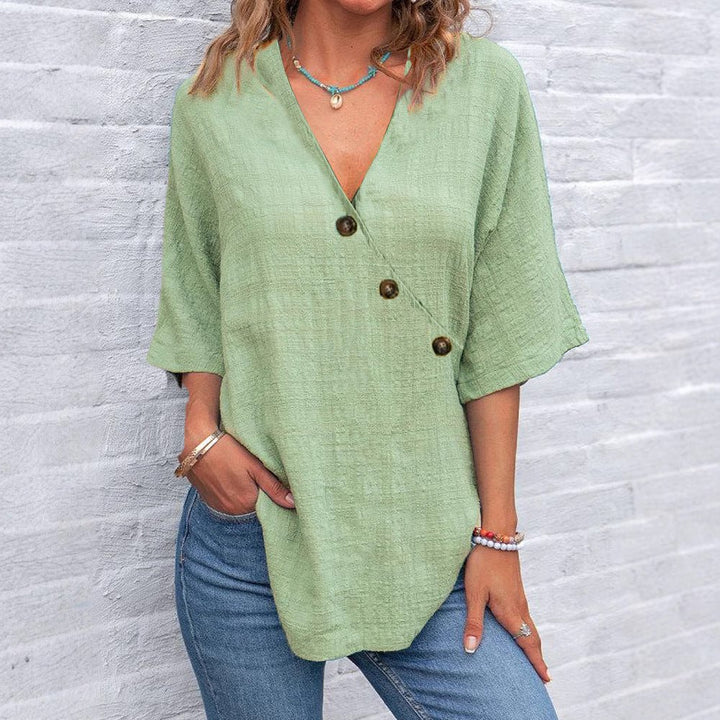 Kiray – V-Neck Blouse with Asymmetric Button Detail
