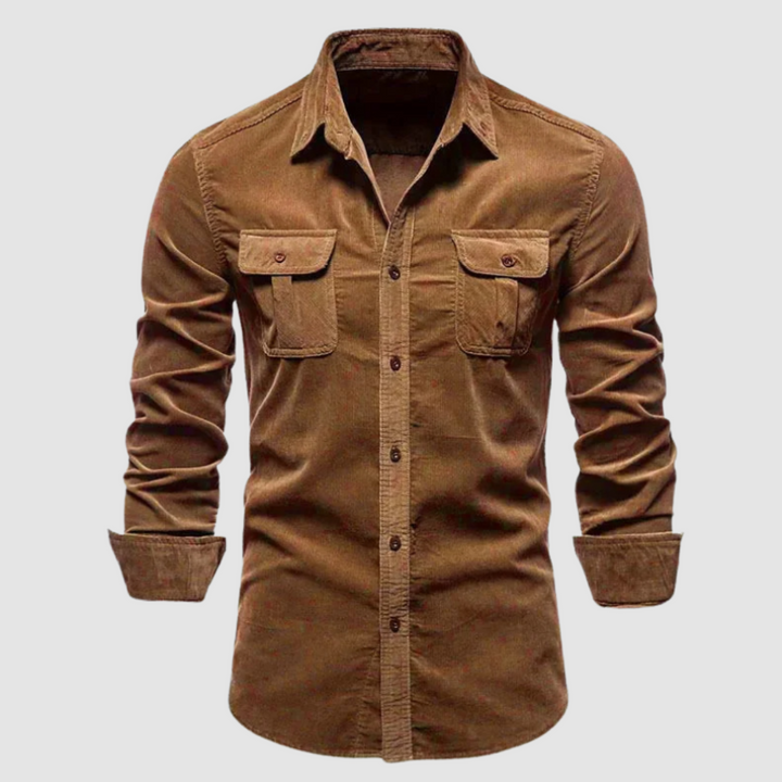 Brown corduroy shirt with buttoned flap pockets, long sleeves, and a collared neckline, on a light gray background.