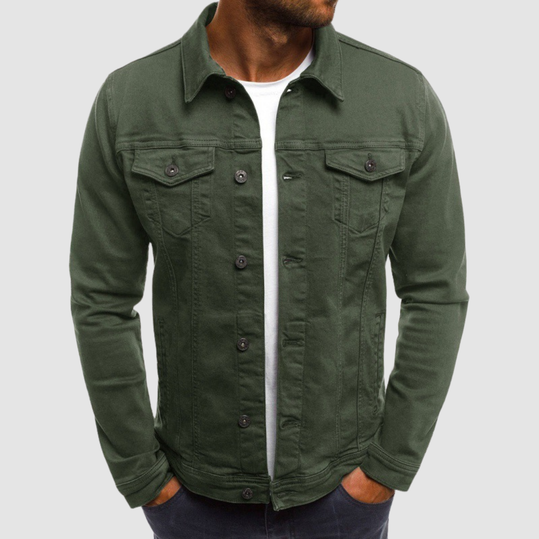Model wearing a green jacket with button closure and chest pockets, paired with a white shirt, against a gray background.