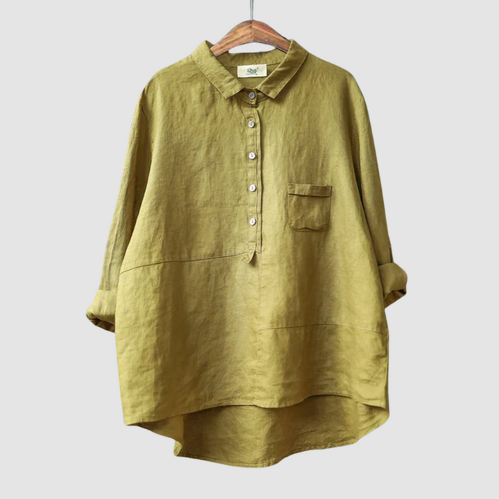 Light olive blouse on hanger with rolled sleeves, button-down front, and chest pocket against a light gray background.