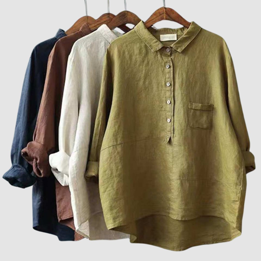 Five blouses in navy, brown, beige, olive, and plum on hangers displayed together against a light gray background.