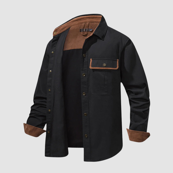 Black shirt partially unbuttoned, brown inner highlights, front pocket, indoor studio.