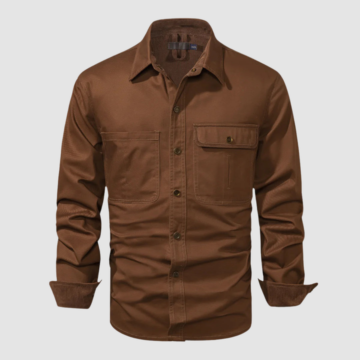 Brown long-sleeved shirt with darker brown inner collar and cuffs, front pocket, plain setting.