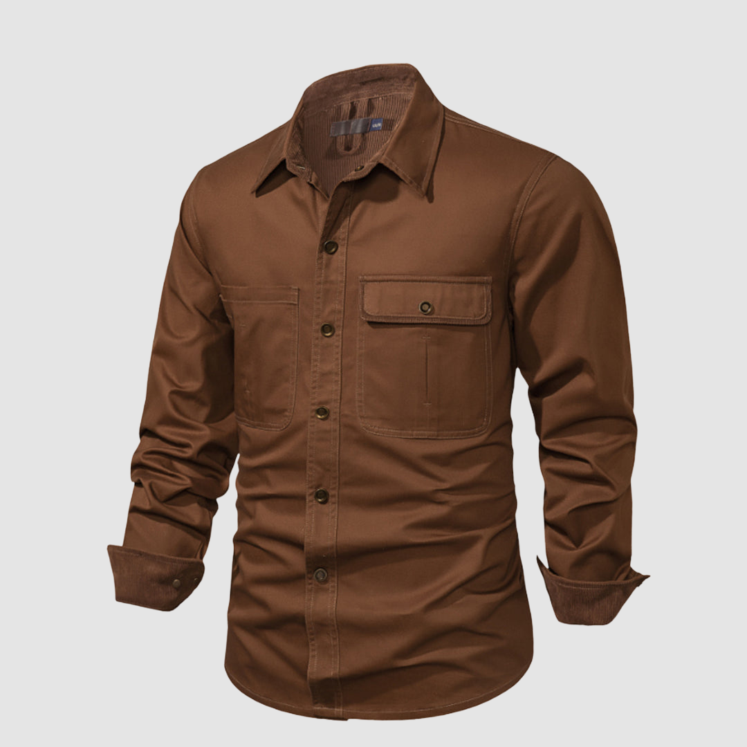 Brown shirt angled view, dark brown inner accents, front pocket detail, studio backdrop.