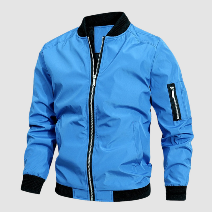 Light blue lightweight bomber jacket with zipper front in a studio setting.