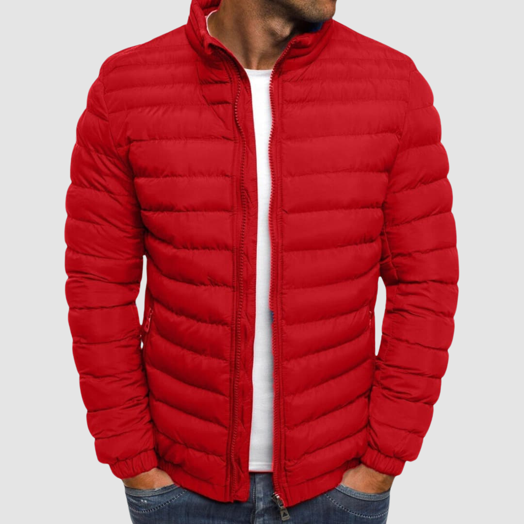 Red lightweight summer jacket with a front zipper, modeled with hands in pockets against a plain background.
