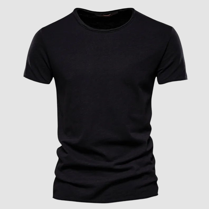 Black short-sleeve t-shirt with a round neck on a plain background.