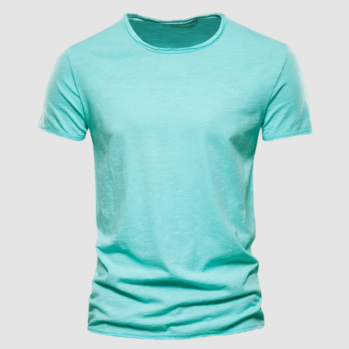 Teal short-sleeve t-shirt with a round neck on a plain background.