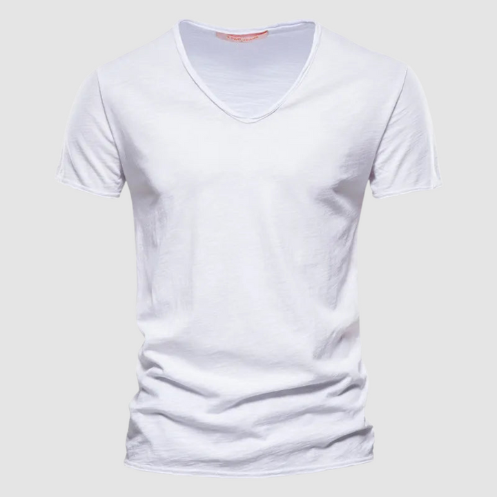Crisp white V-neck summer tee with short sleeves in a studio setting.