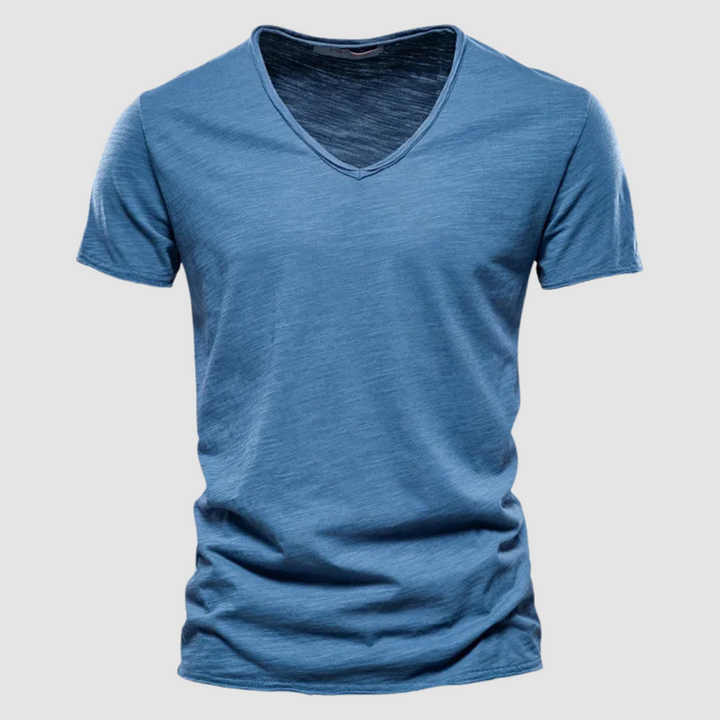 Denim blue V-neck summer tee with short sleeves in a studio setting.