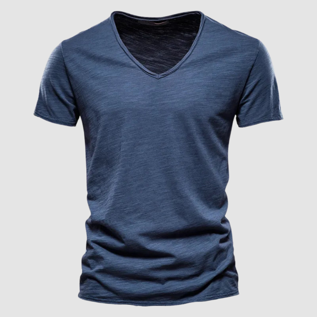 Slate blue V-neck summer tee with short sleeves in a studio setting.