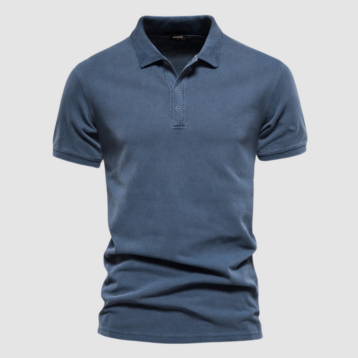 Blue modern fit polo shirt displayed on a plain light gray background.