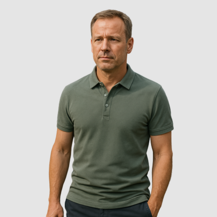 Man wearing olive green modern fit polo, standing against a plain light gray background.