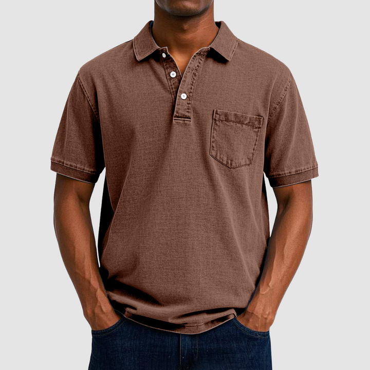 Brown casual polo shirt with short sleeves and buttoned collar, displayed on a model in a studio.