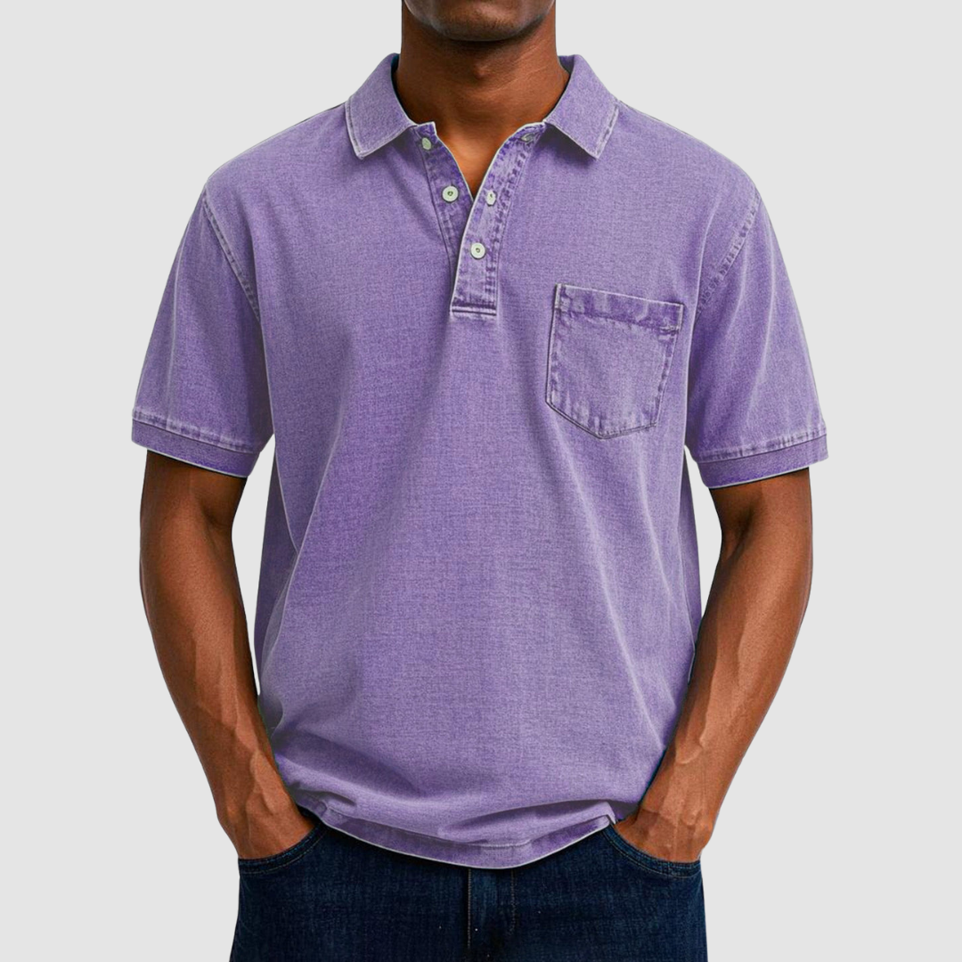 Purple casual polo shirt with short sleeves and buttoned collar, showcased by a model in a studio environment.