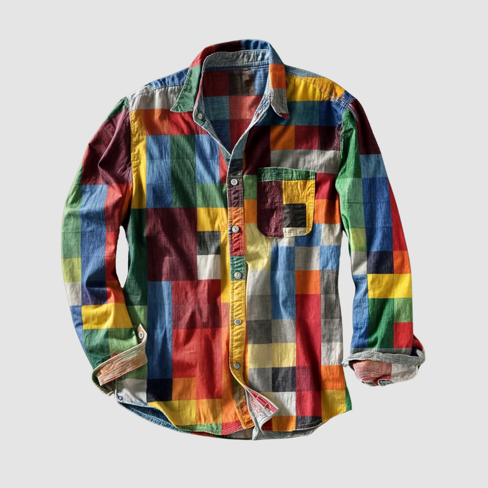 Colorful, checkered button-up shirt with a single front pocket, laid flat against a plain gray background.