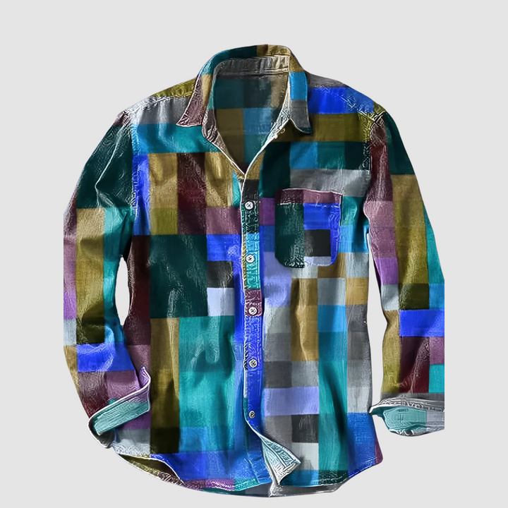 Shiny, colorful checkered shirt with long sleeves, flat on a pale gray background, featuring a button-up and pocket.