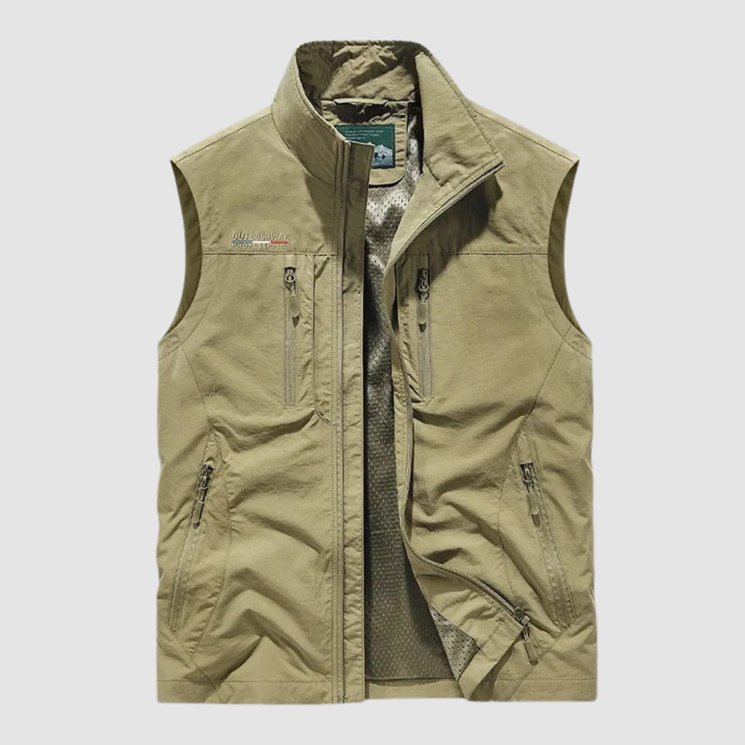 Tan breathable utility vest with zipper pockets on a light gray background.