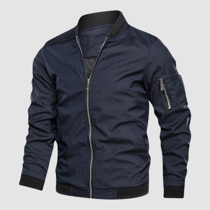 Navy blue lightweight bomber jacket with zipper front in a studio setting.
