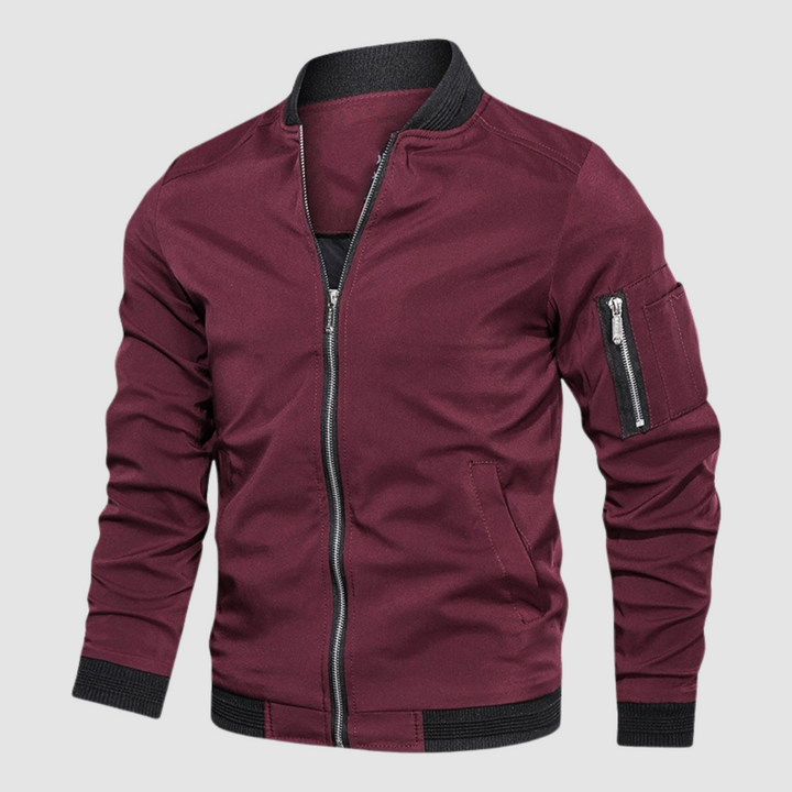 Burgundy lightweight bomber jacket with zipper front in a studio setting.