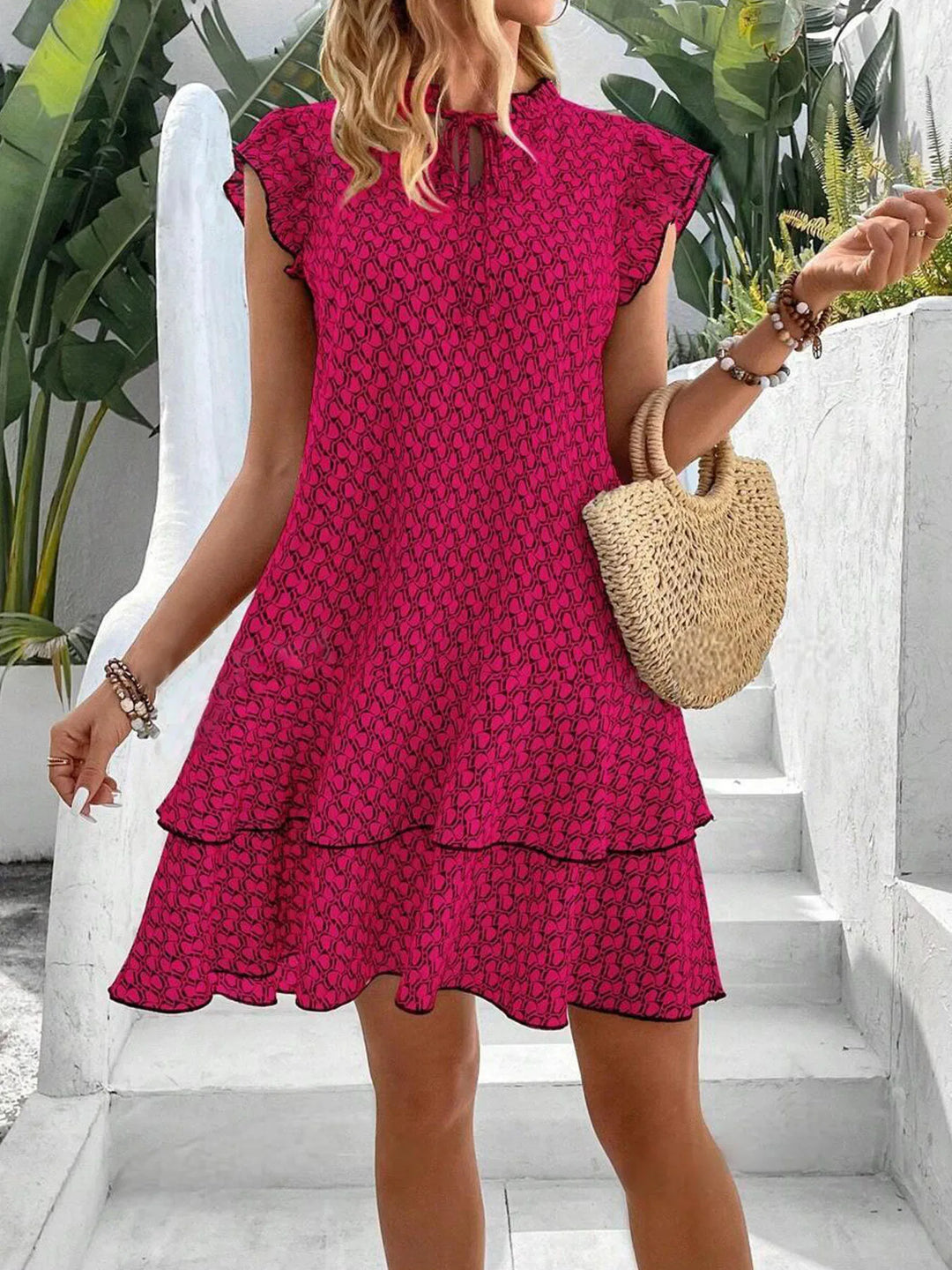 Krest – Printed Ruffle Mini Dress with Tie Neck