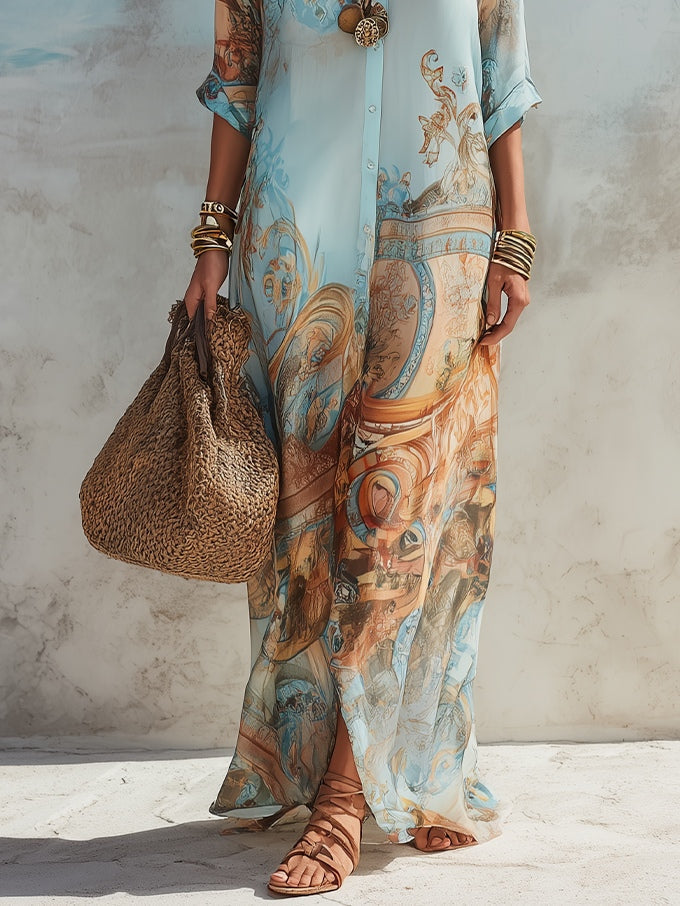 Partial view of floral maxi dress with ornate design and accessories, emphasis on sandals and woven bag, in a studio setting.