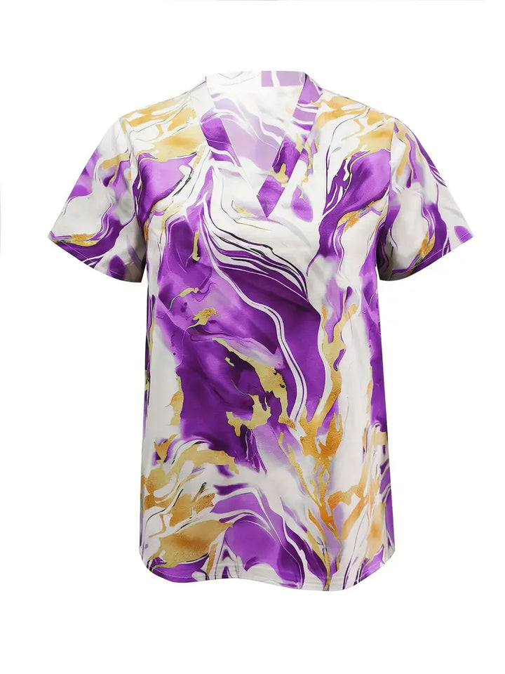Purple marble print short sleeve shirt with v-neck on a white studio background.