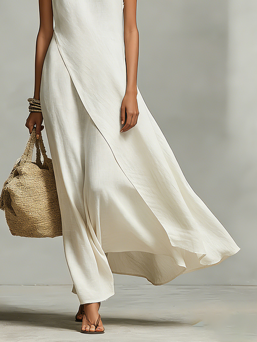 Close-up of the flowing ivory loose-fit maxi dress&
