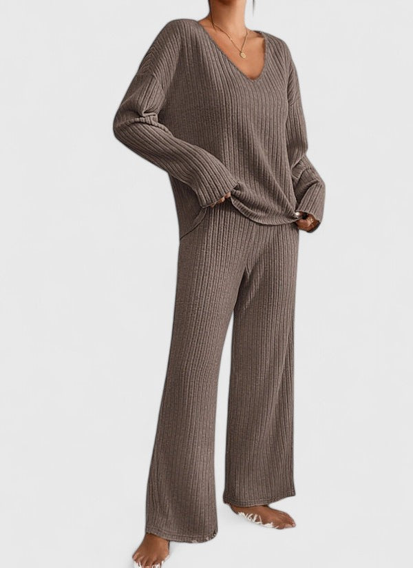 Brown ribbed V-neck long-sleeve top and matching wide-leg pants in studio setting.