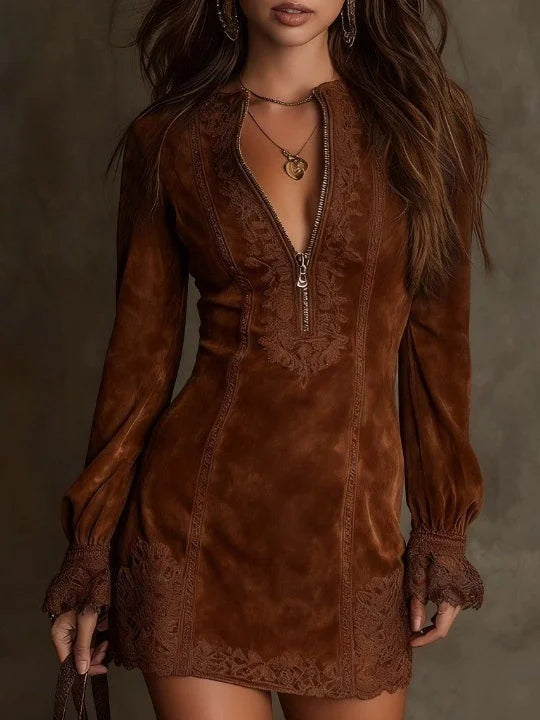 Brown suede mini dress with lace accents, long sleeves, and zipper front in a studio setting.