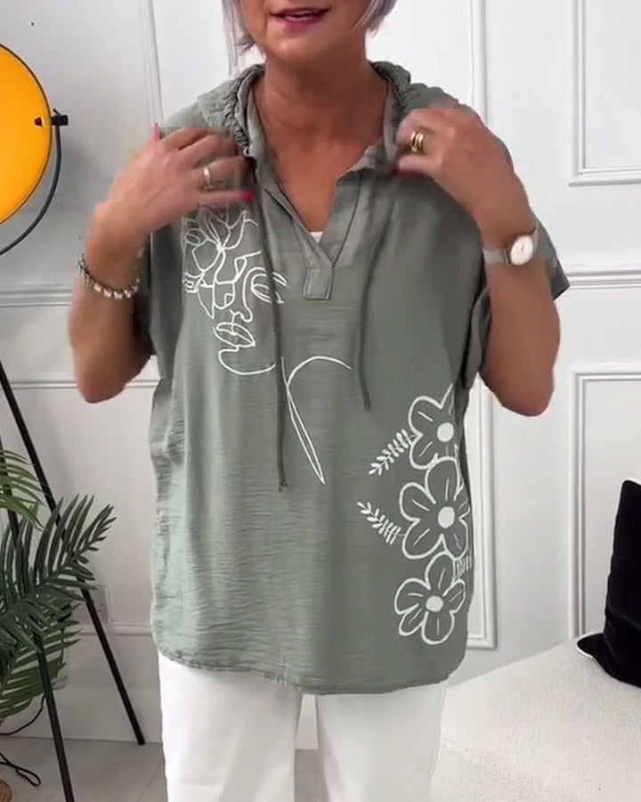 Esme – Floral Hooded Blouse with Lace-Up Neckline