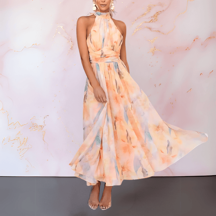 Flowy printed dress with a halter neckline, capturing movement, styled with statement earrings in a pastel studio.
