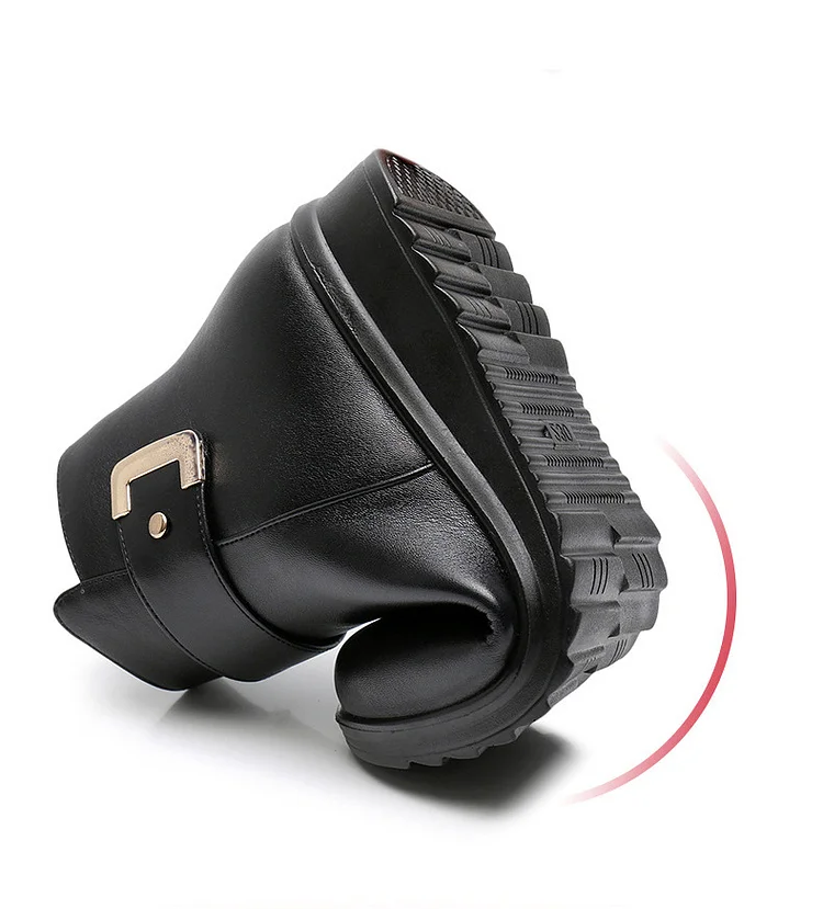 Black boot bending to demonstrate flexibility, showing sole and gold buckle detail, on a white background.