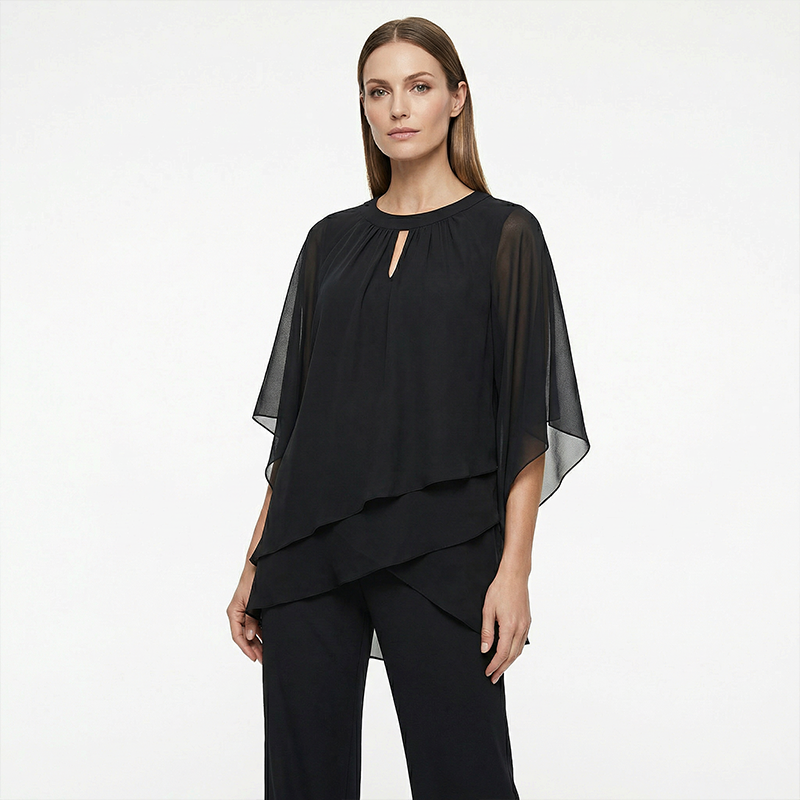 Black elegant outfit displayed against a white studio background.