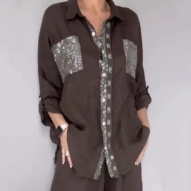 Dark brown elegant set with sequined pockets and buttons, presented in a gray studio environment.